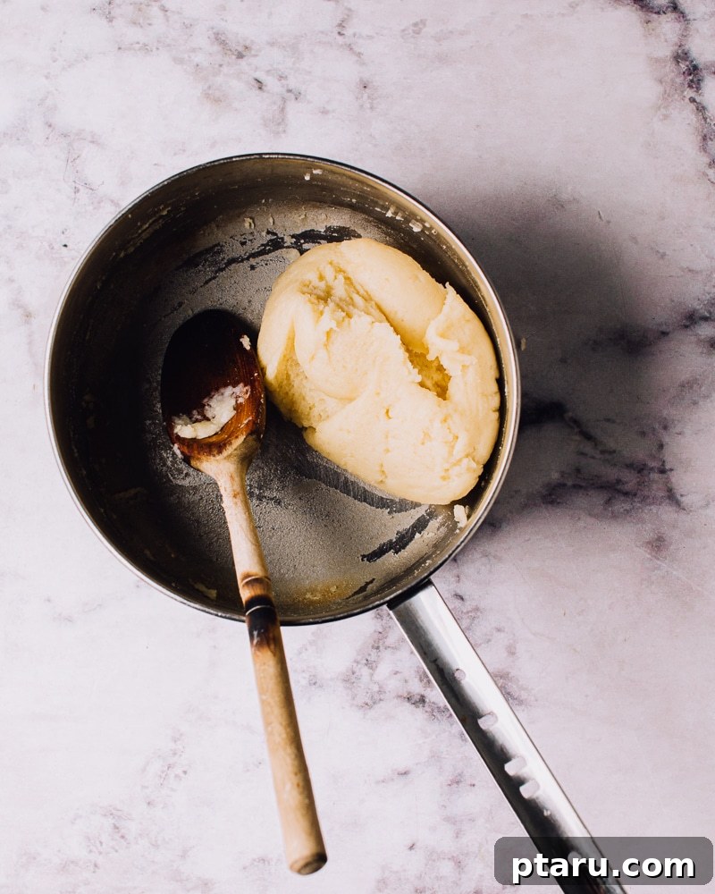 Airy French Doughnuts 8 Choux pastry dough forming a smooth ball and leaving a film on the saucepan