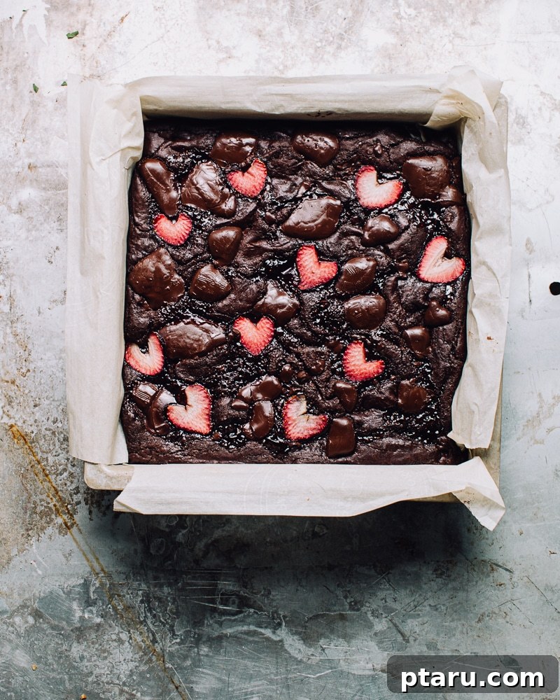 Ruby Red Brownie Bliss 4 Freshly baked strawberry brownies, cooling in the pan after coming out of the oven.