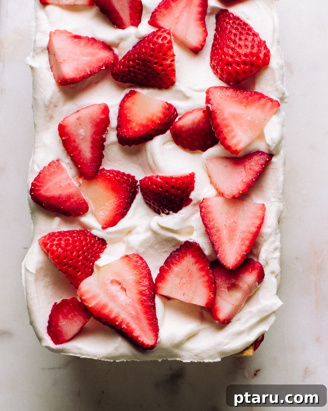 No-Bake Strawberry Dream Cake 4 A whole strawberry icebox cake before slicing.