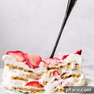 A slice of strawberry cream cheese icebox cake.