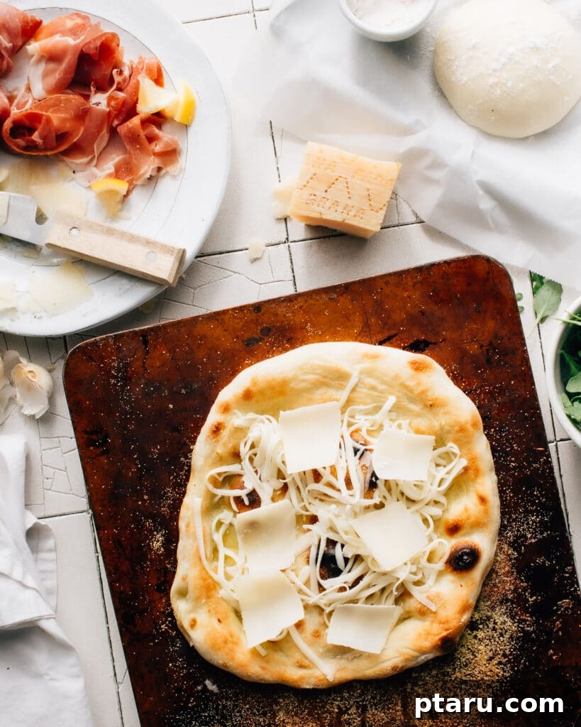 Parma Prosciutto, Arugula and Shaved Grana Padano Pizza 4 Ingredients for Prosciutto di Parma Pizza with Arugula and Grana Padano