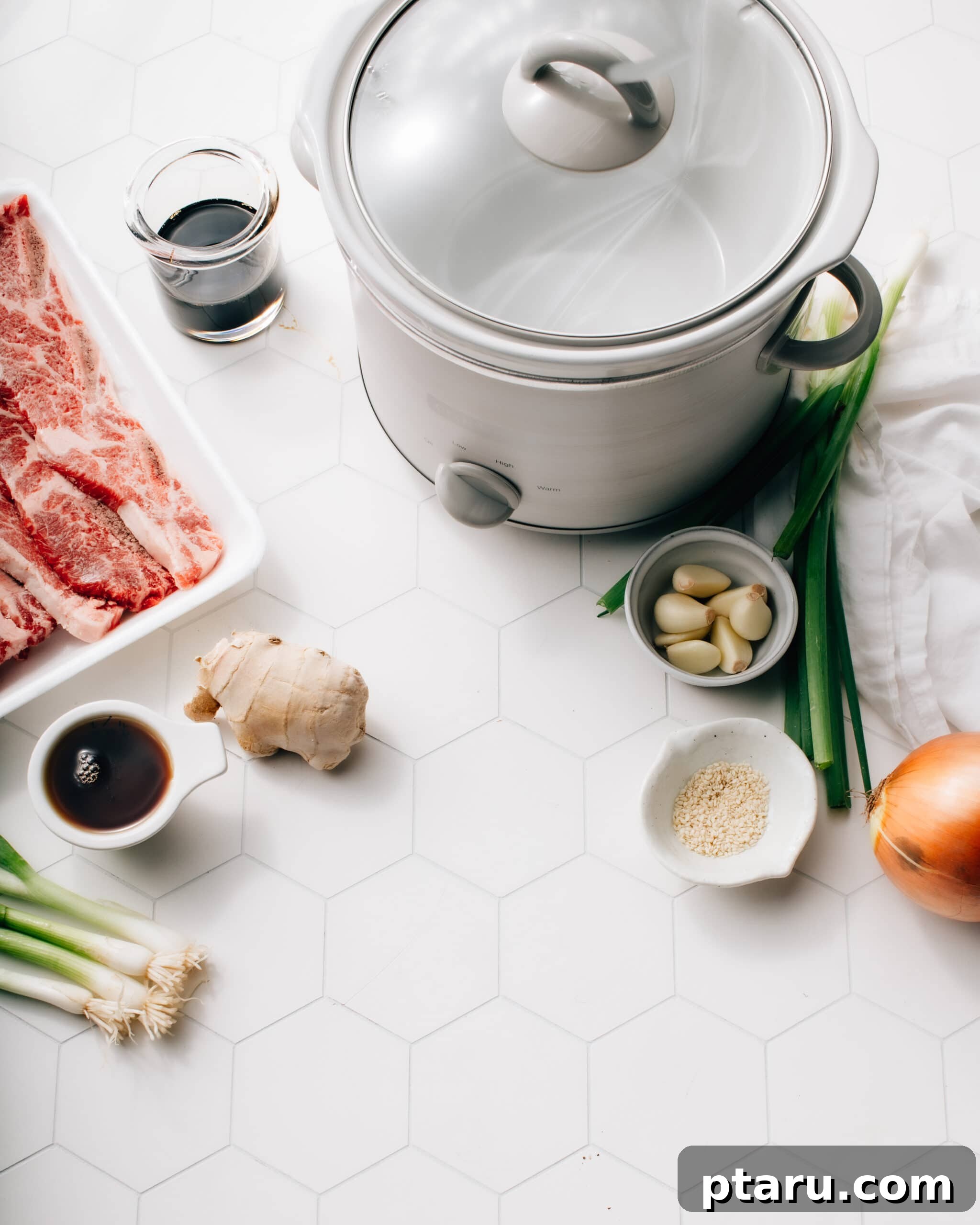 Fall-Off-The-Bone Korean Ribs 3 Slow Cooker short ribs with onions and sauce
