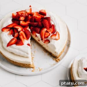 Effortless Cloud Cheesecake 10 No Bake Cheesecake with my best of all recipes for Graham Cracker Crust, topped with strawberries and blueberries.