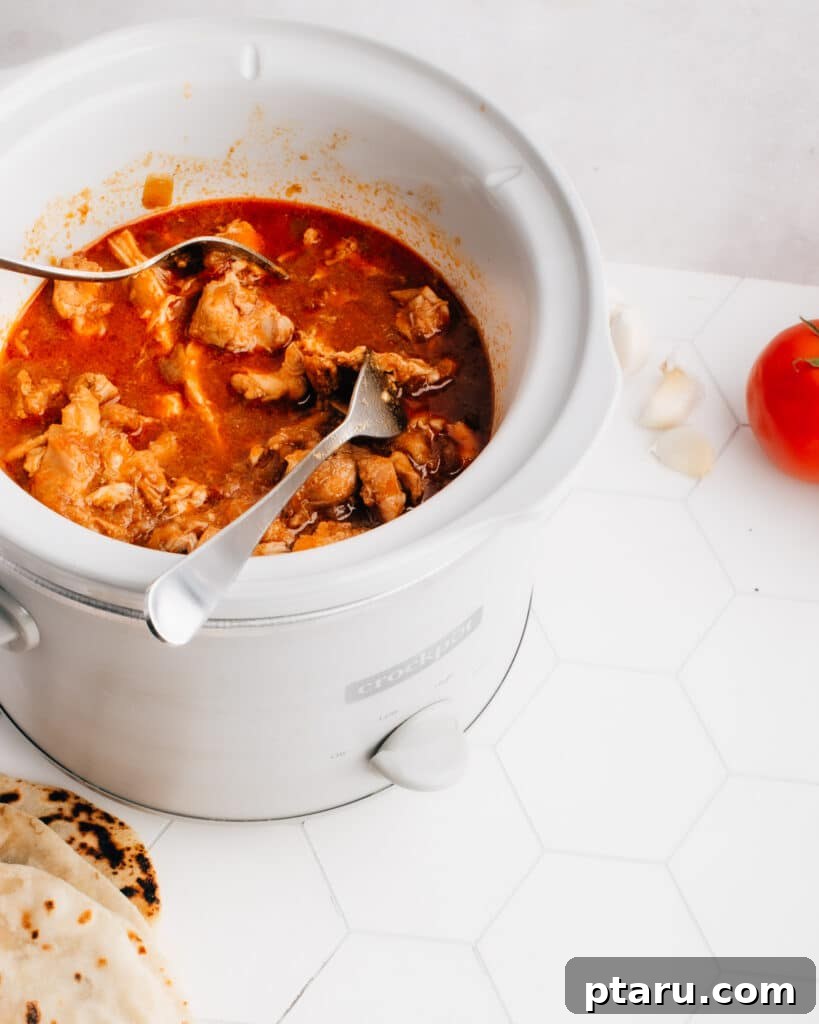 Effortless Crockpot Chicken Tacos 4 These easy Shredded (or pulled) Chicken Tacos are cooked in a crockpot with the best, crazy-delicious sauce. You don't want to miss my tips for the best way to shred chicken, plus a comprehensive list of yummy chicken taco toppings. A slow cooker makes this healthy recipe super simple and hands off.