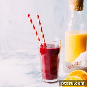 Delicious Cherry-Berry Beet Smoothie in a glass, ready to drink.