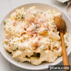 This Classic Homemade Potato Salad with egg recipe is the best I've made. It is super easy with a tangy, lemony, creamy mayonnaise-based dressing that I lighten up with Greek yogurt. The mix-in possibilities are endless with this tested-till-perfect, from-scratch recipe as your canvas