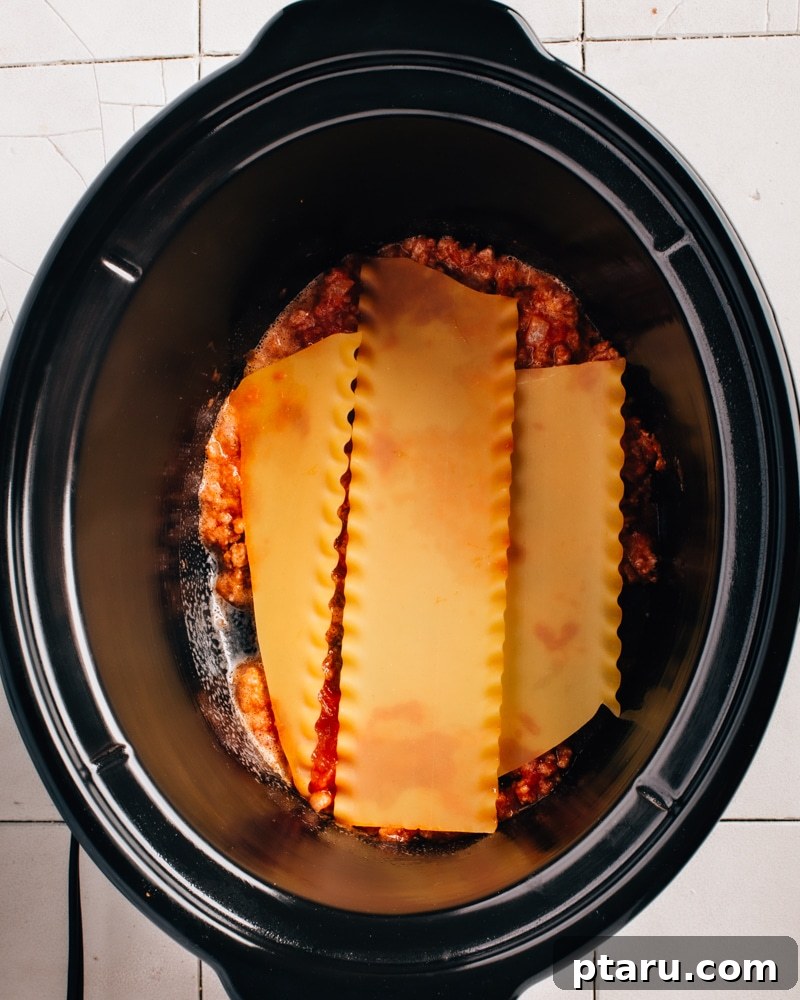 Effortless Cheesy Slow Cooker Lasagna 4 Layering Crockpot Lasagna in a slow cooker