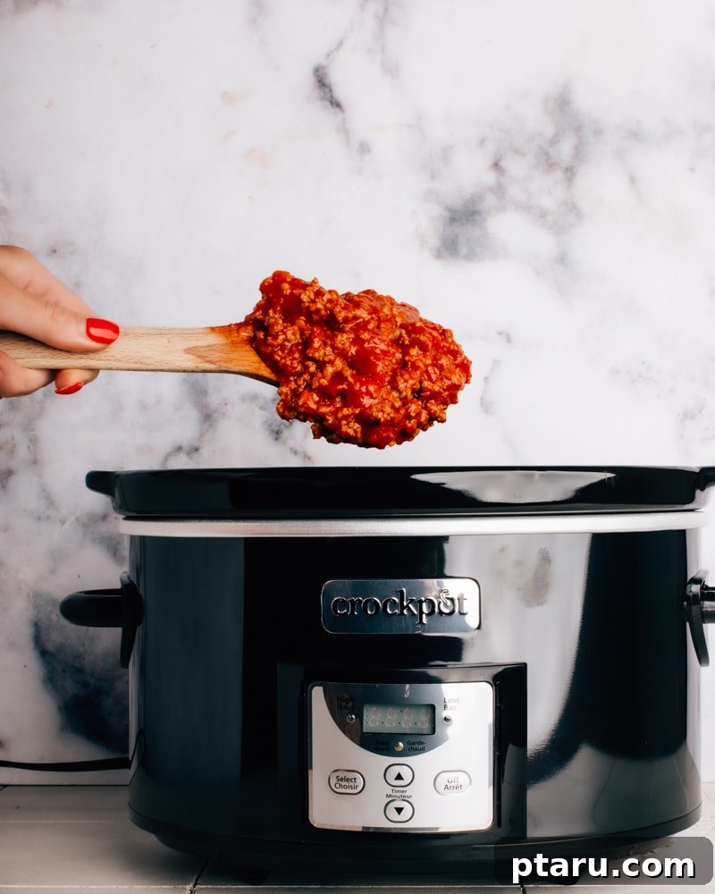 Effortless Cheesy Slow Cooker Lasagna 6 Crockpot lasagna served with fresh parsley
