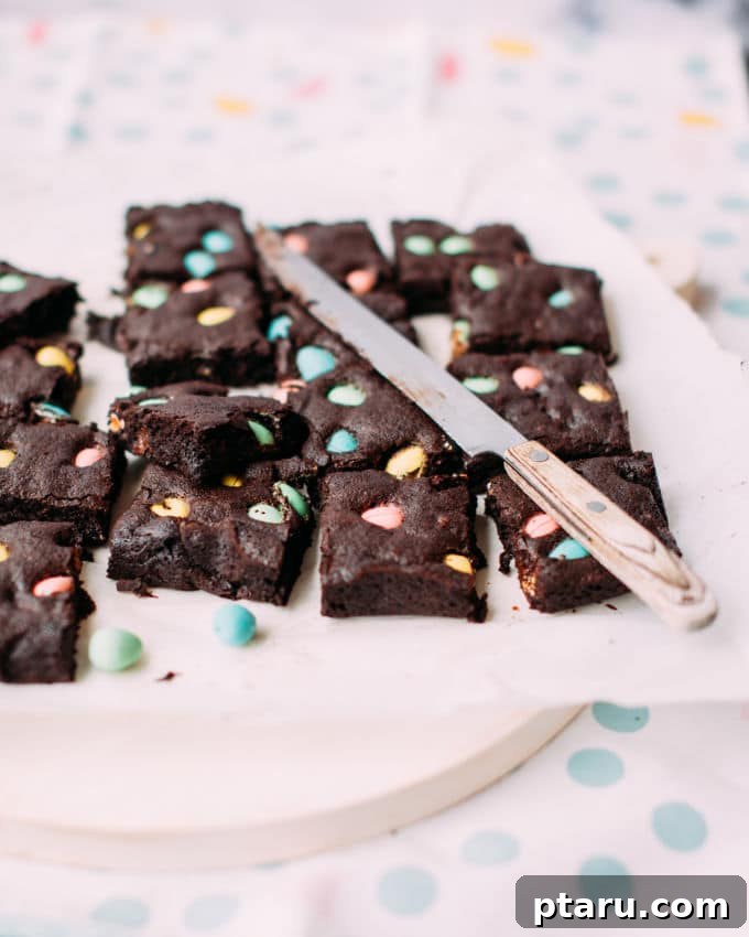 Hoppy Easter Brownies 5 Easter brownies sliced into long strips with easter eggs on them.
