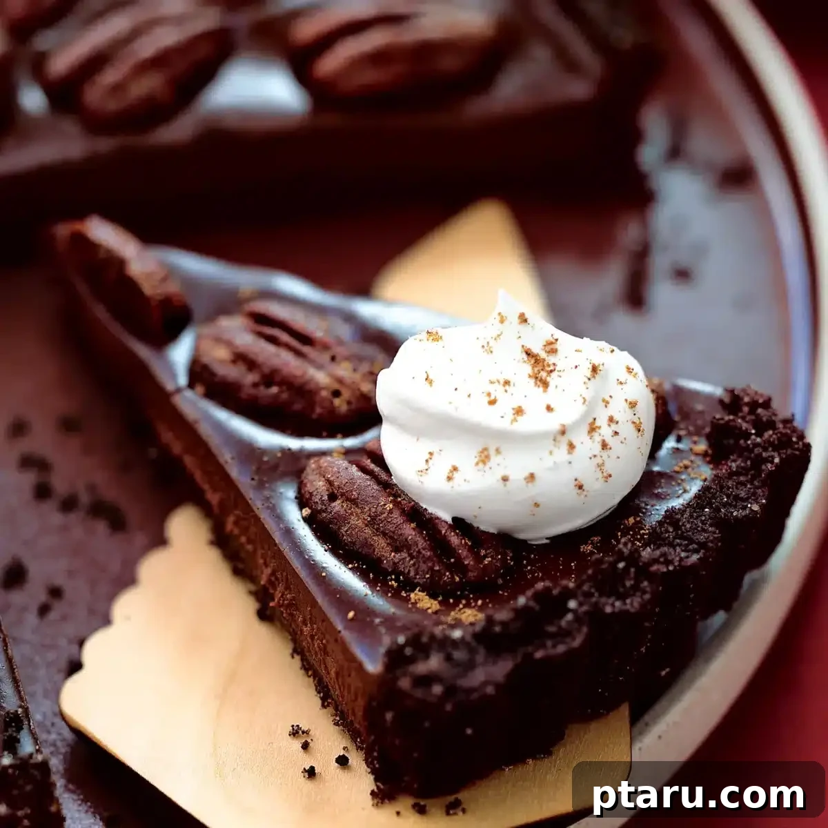20 Deliciously Easy Chocolate Christmas Desserts 12 An enticing Cinnamon Spice Mexican Chocolate Tart, rich and inviting, perfect for a festive treat.