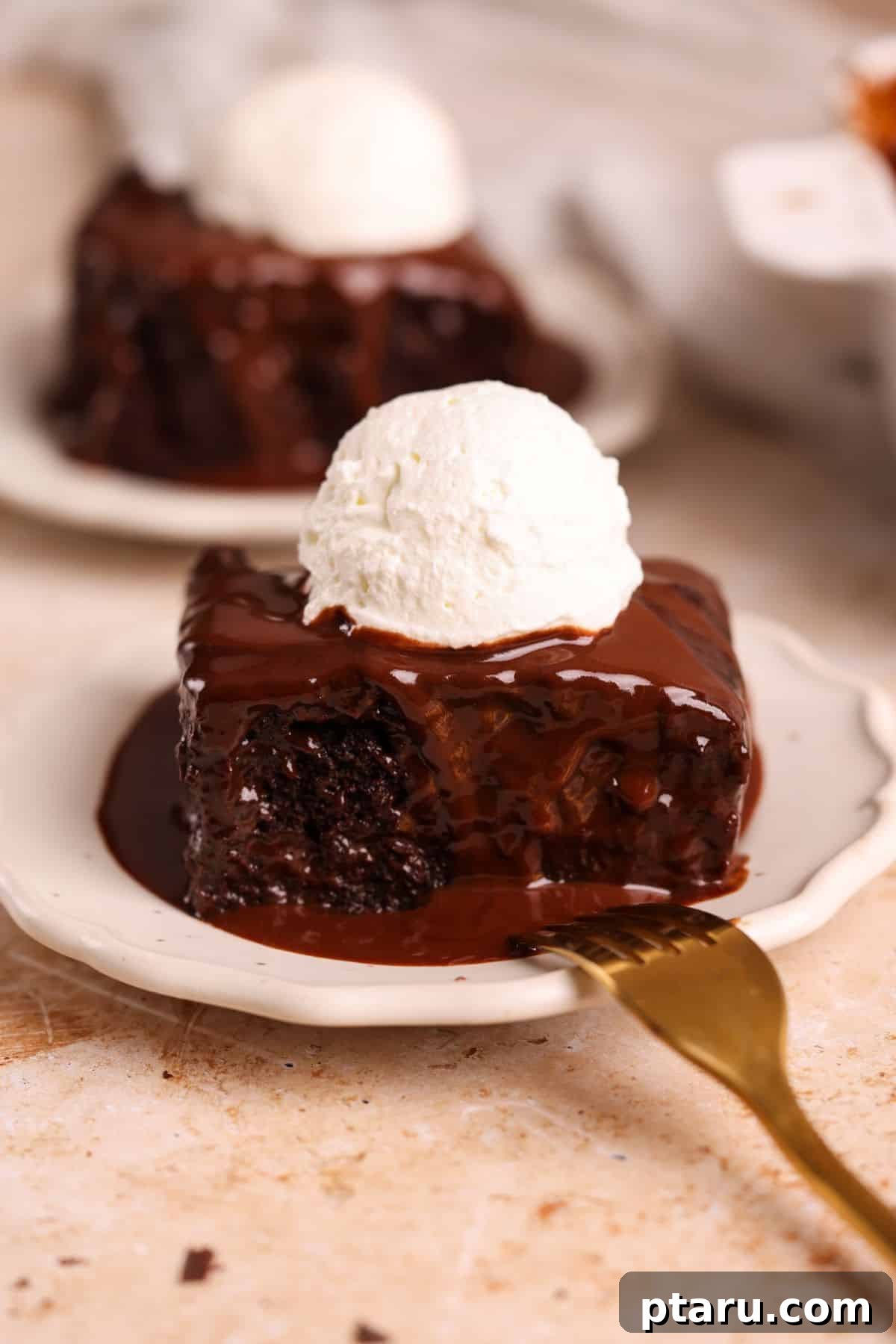 20 Deliciously Easy Chocolate Christmas Desserts 21 A rich and inviting Chocolate Sticky Toffee Pudding, served warm with a side of vanilla ice cream, promising pure indulgence.