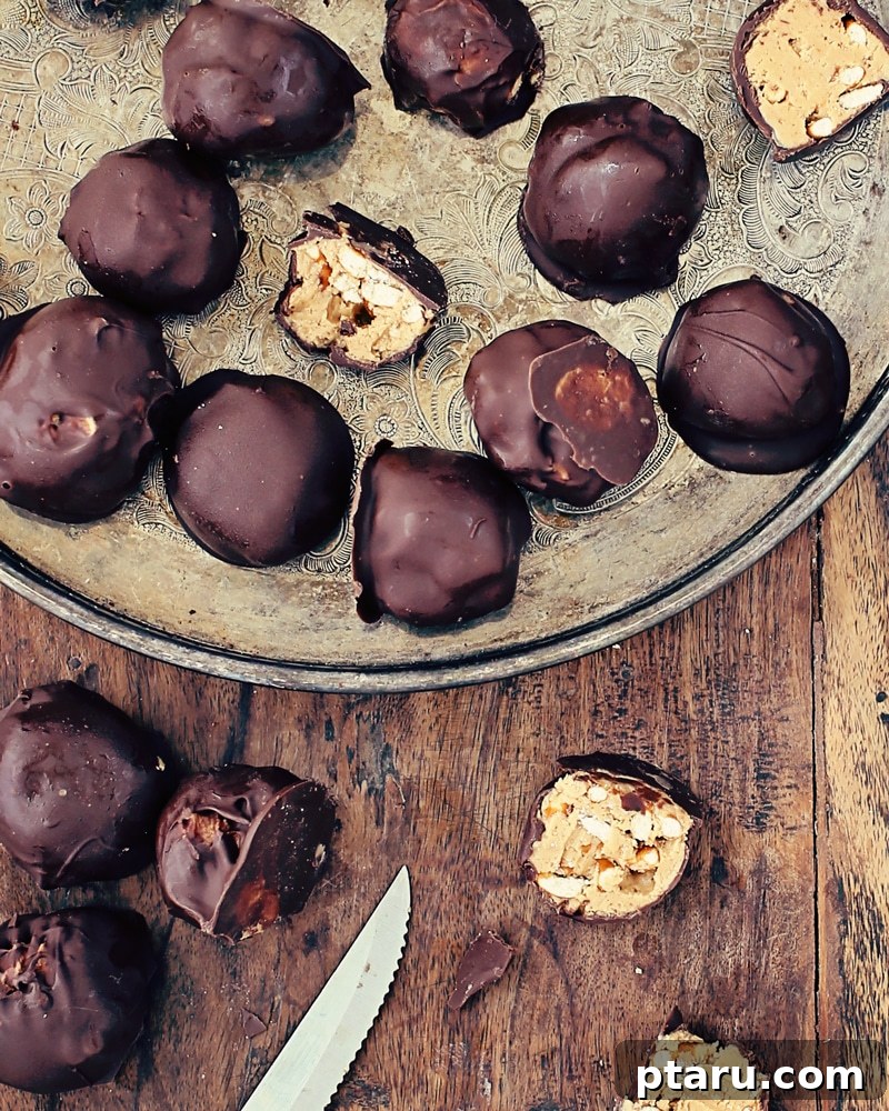 Effortless Festive Bites: 15+ No-Bake Christmas Sweets 8 Pretzel Peanut Butter Balls.