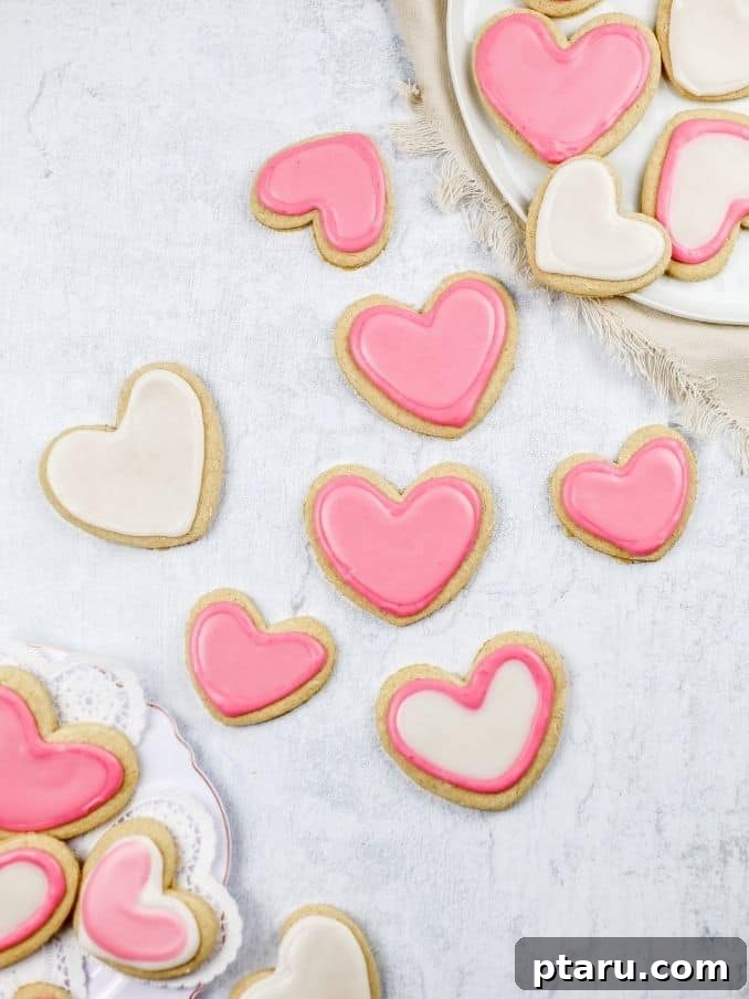 Love at First Bite: Simple Valentine's Sugar Cookies 11 Beautifully decorated ginger sugar cookies, perfect for Valentine's Day, showcasing intricate icing designs.