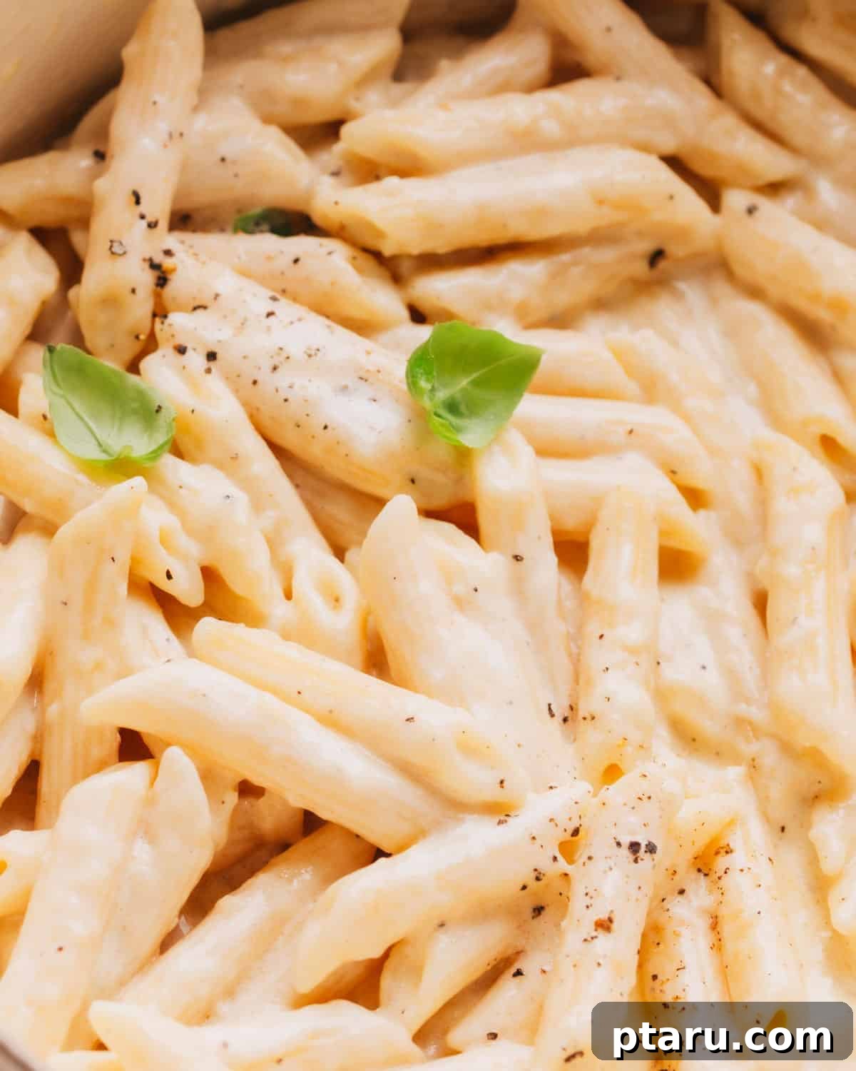 14+ Stress-Free & Delicious Valentine's Family Dinners 5 Alfredo Sauce with Penne Pasta in Sauce Pan