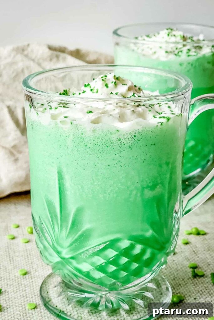 Get Lucky with These Green St. Patrick's Day Desserts 12 A tall, elegant glass filled with a bright green copycat Shamrock Shake, crowned with a generous swirl of whipped cream and a cherry, invitingly presented for St. Patrick's Day.