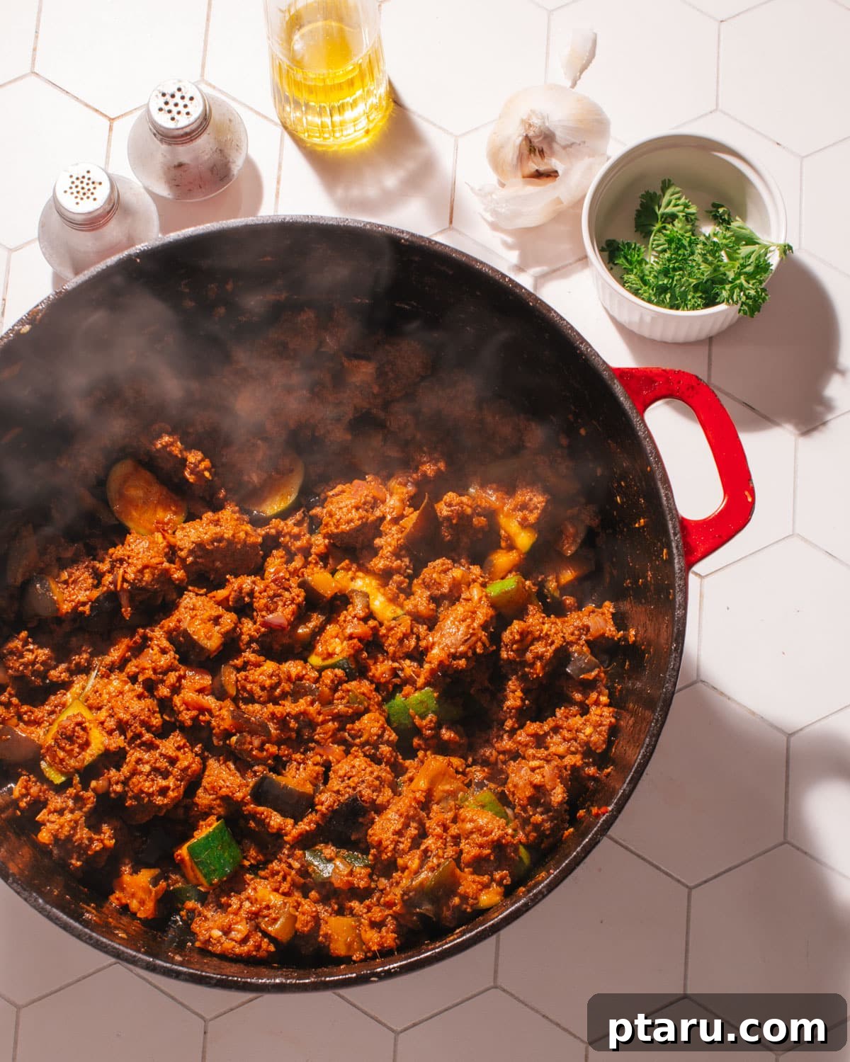 Hellenic Shepherds Pie 5 Rich Greek Moussaka-style meat sauce in a pot