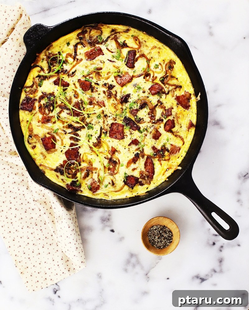 Golden Rosti Quiche: Sausage, Caramelized Onion, and Gruyere 5 Assortment of fresh ingredients, including eggs, milk, cream, cheese, and vegetables, prepared for making the quiche.