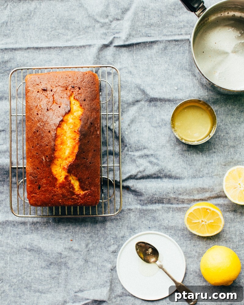 Sunshine Lemon Pound Cake 3 Close-up of the perfectly baked lemon pound cake showing its moist crumb texture and a hint of the lemon glaze.