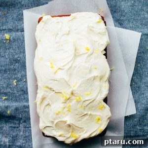 The finished Lemon Pound Cake, elegantly frosted and ready for serving.