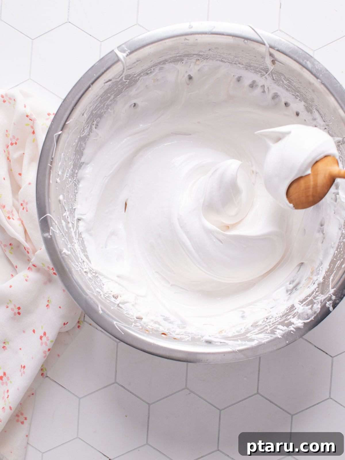 Serving Suggestions A bowl of freshly whipped cream, perfect for serving with orange cake.