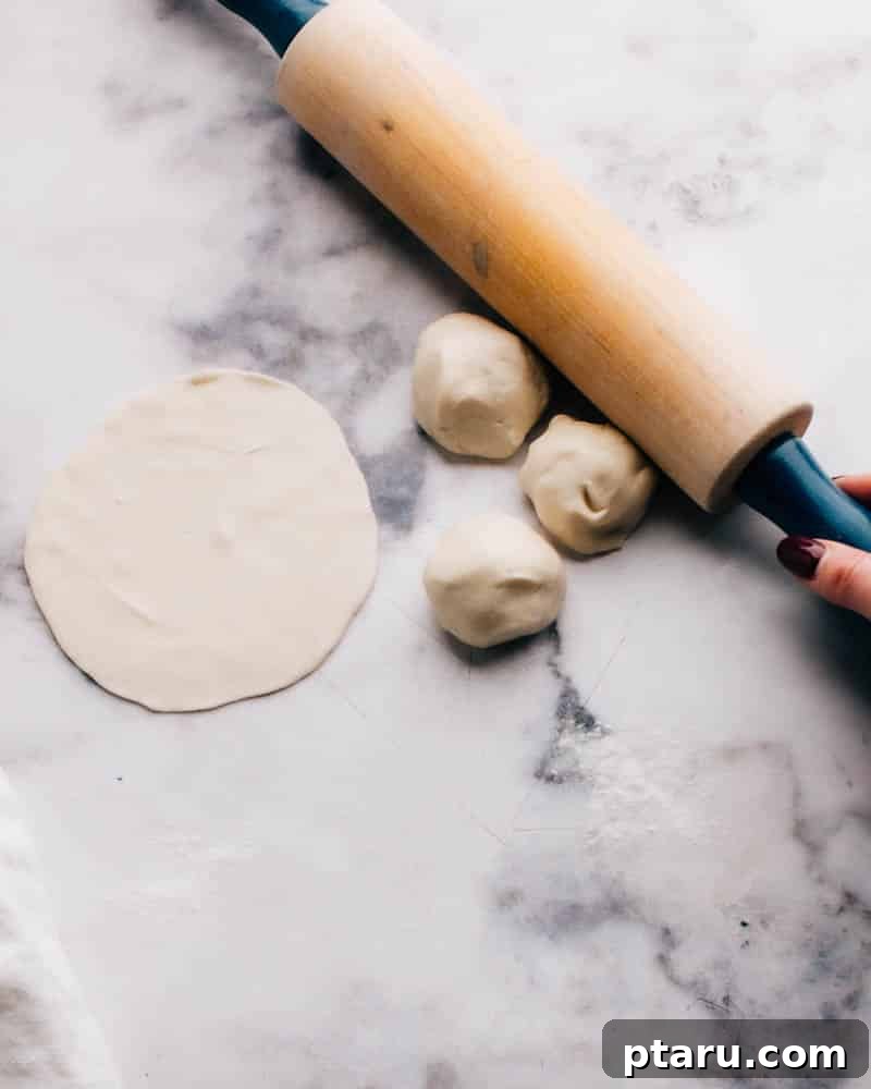 Quick & Fresh Homemade Tortillas 4 Rolling out dough for fresh flour tortillas on a floured surface.