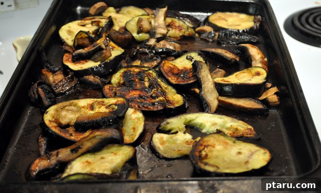 Savory Roasted Eggplant and Portobello Lasagna 3 A freshly baked pan of Roasted Eggplant and Portobello Mushroom Lasagna, golden and bubbling.