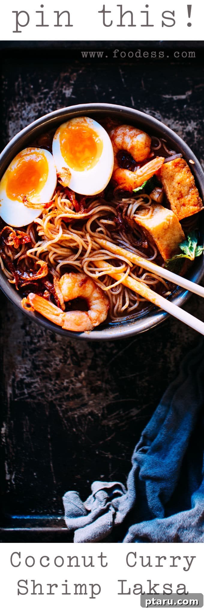 Tropical Coconut Shrimp Laksa 5 A beautifully arranged bowl of Coconut Shrimp Laksa with a close-up on the toppings and noodles.