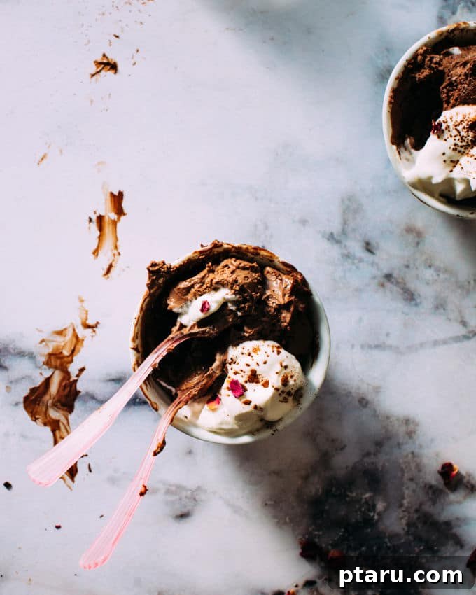 Effortless Blender Chocolate Mousse 4 Three servings of chocolate mousse topped with whipped cream and chocolate shavings