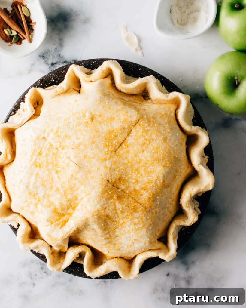 Simple Hand-Mixed Pie Crust 18 A freshly assembled apple pie, ready to be baked to golden perfection.