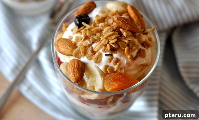 Artisan Granola Bliss 5 A close-up shot of a bowl brimming with perfectly golden and clustered homemade granola, garnished with fresh berries, ready for a delicious meal.
