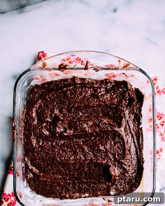 Velvet Chocolate Pudding Bake 3 Close-up of the rich, moist chocolate cake layer and gooey self-saucing chocolate pudding