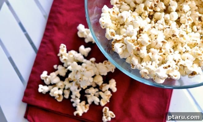 Sweet & Salty Pop Perfection 2 A large bowl of freshly made kettle corn, glistening with sugar and salt.