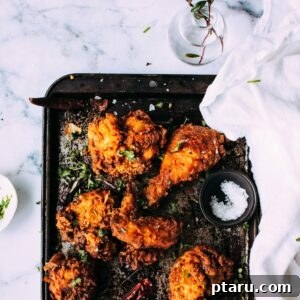 Tandoori Fried Chicken 4 Tandoori Fried Chicken served with a side dish