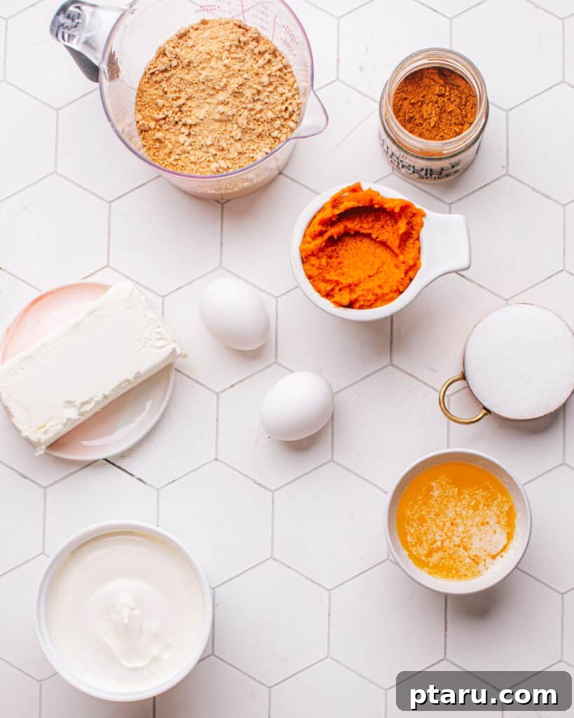 Easy Pumpkin Cheesecake Bars 3 Assorted ingredients for making Pumpkin Cheesecake Bars.