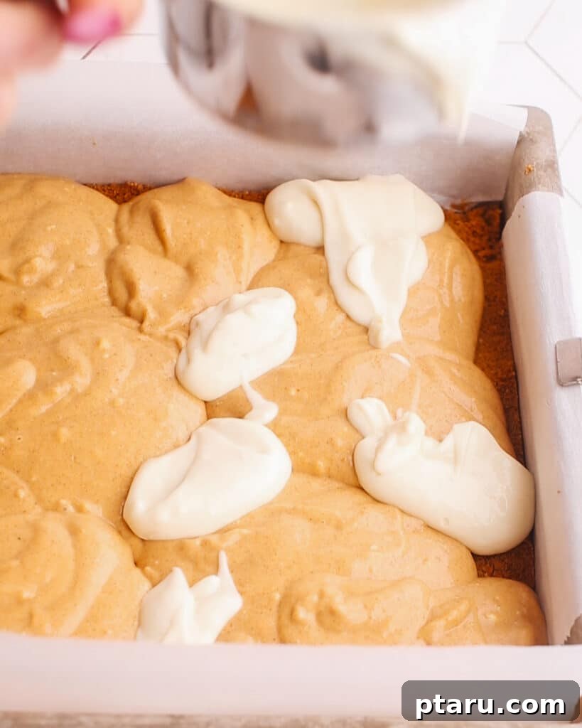 Easy Pumpkin Cheesecake Bars 6 Swirling vanilla cheesecake into pumpkin cheesecake bars.