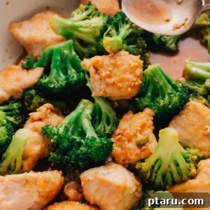 The chicken and broccoli stir fry is cooked in a large skillet.