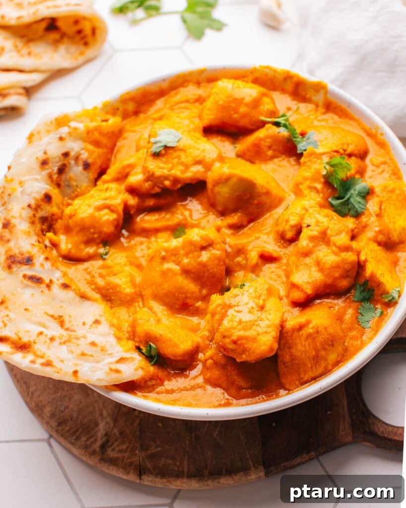 Paratha Golden Layered Indian Flatbread 21 Curry Chicken in a bowl.