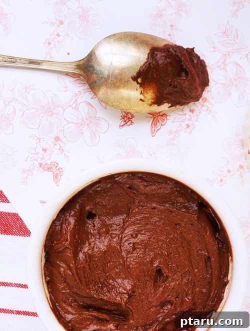 Rich Chocolate Raspberry Inverted Delights 5 Ramekins filled with raspberries and chocolate batter, ready for baking