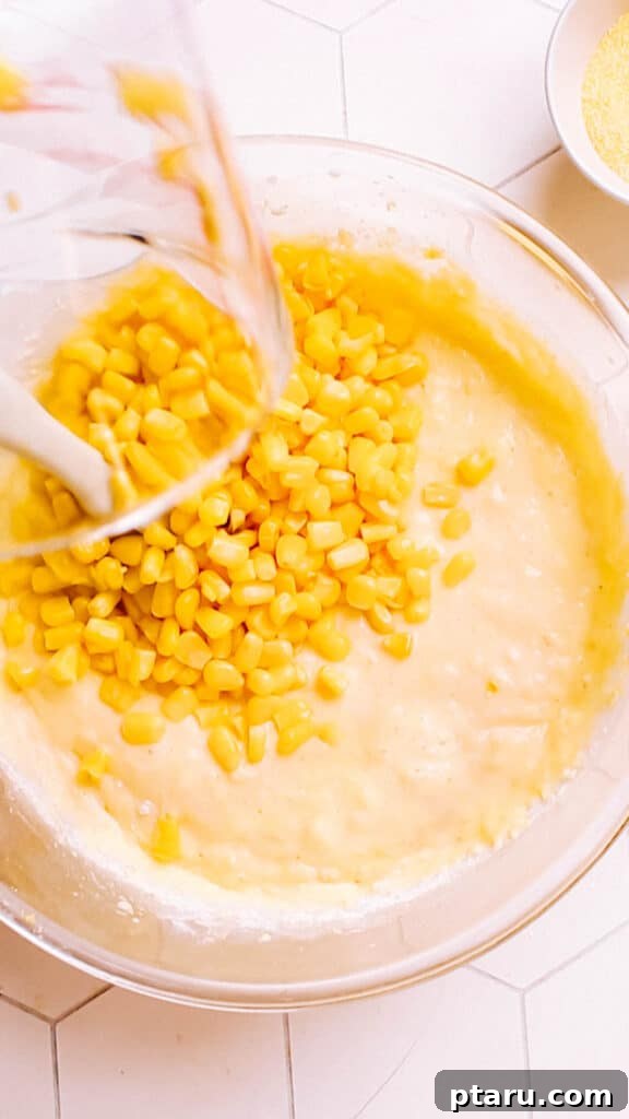 Golden Cornbread Bake 12 Adding corn kernels.