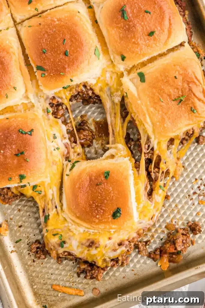 Over 35 Mouthwatering Leftover Taco Meat Recipes 30 Taco meat sliders on a baking sheet