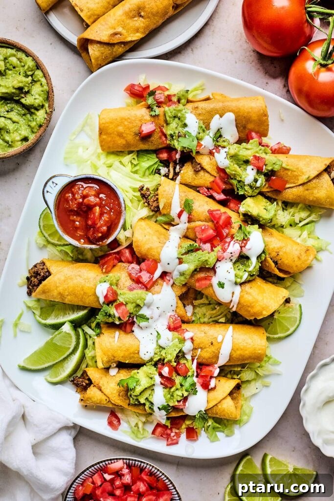 Over 35 Mouthwatering Leftover Taco Meat Recipes 10 Crunchy taquitos plated with sour cream and salsa
