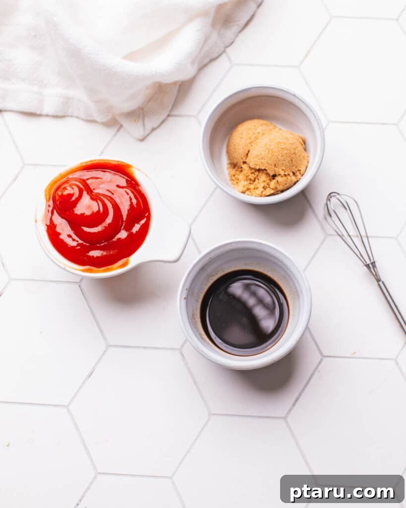 Foolproof 3 Ingredient Meatloaf Glaze 3 Three small bowls displaying the simple ingredients for the meatloaf glaze: ketchup, brown sugar, and Worcestershire sauce.