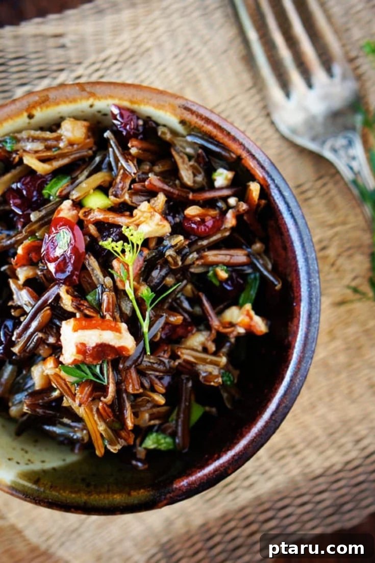 Nutty Wild Rice Medley 5 A beautifully plated bowl of wild rice salad with fresh herbs