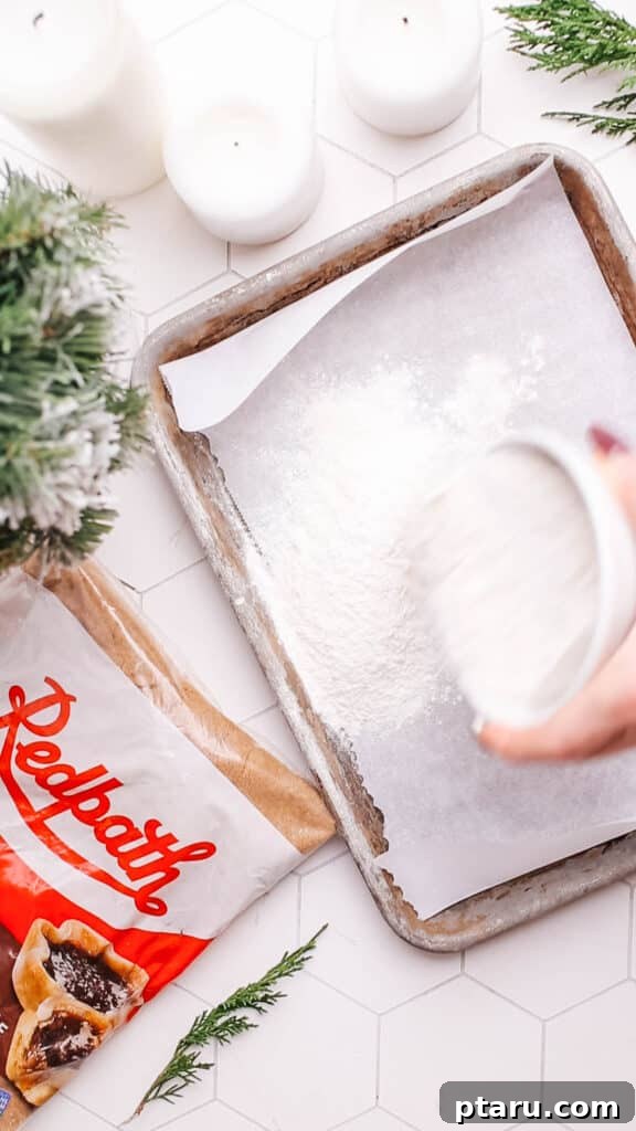 Effortless Cookie Dough Bliss 6 Preparing the all-purpose flour for heat treatment by spreading it evenly on a baking sheet, a vital step for ensuring safe edible cookie dough.
