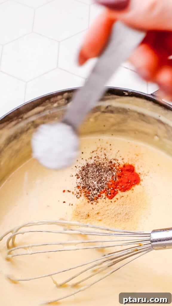 Mac and Cheese Perfection: The Ultimate Golden Sauce 9 Seasoning cheddar cheese sauce for macaroni and cheese.