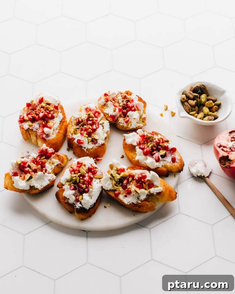 Jeweled Goat Cheese with Pomegranate and Pistachios 2 Goat Cheese appetizer with pomegranate and pistachios.