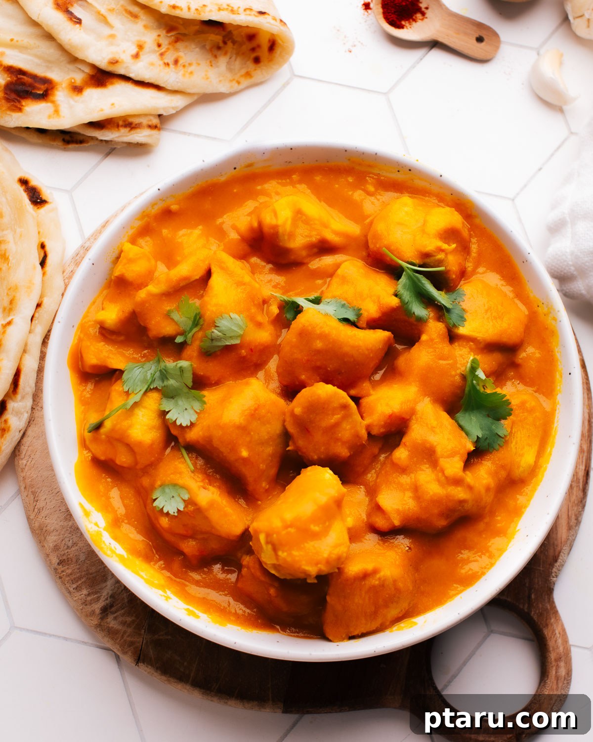 Your New Favorite Quick Coconut Curry Chicken 6 A second view of Indian Coconut Curry Chicken in a bowl, garnished with cilantro, highlighting its inviting presentation.