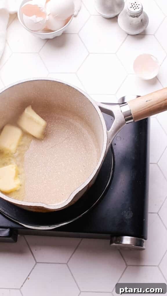 Easy Turkey Giblet Gravy No Drippings 6 Melted unsalted butter in a saucepan, ready for the flour to be added to make a roux.