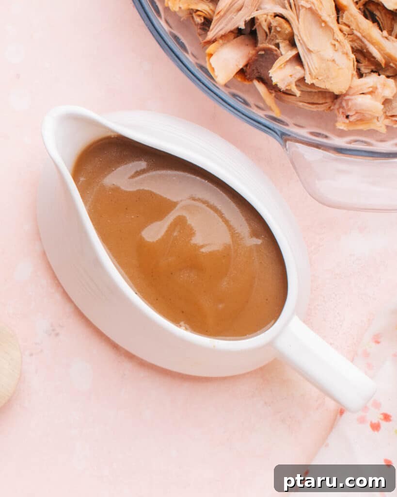 Easy Turkey Giblet Gravy No Drippings 10 Smooth, rich turkey giblet gravy served in a elegant gravy boat, ready for the dining table.