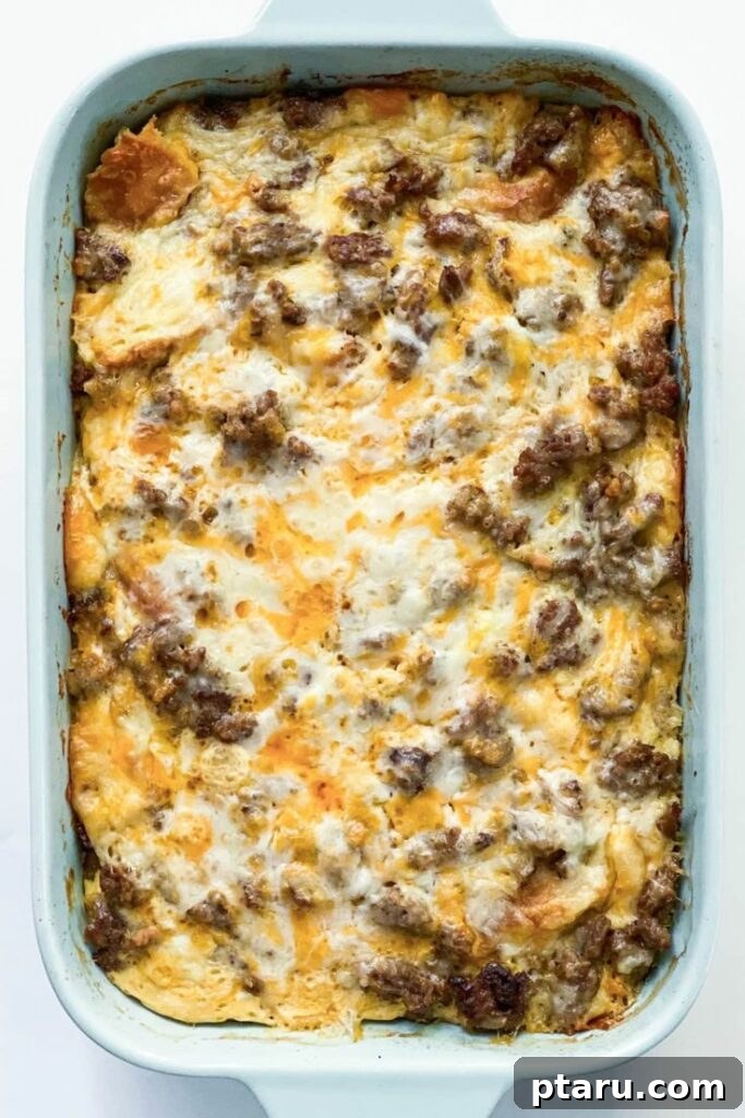 Rise and Shine: 23+ Sausage and Egg Breakfast Ideas 7 A delicious Sausage Breakfast Casserole with a golden-brown top, bubbling with cheese and savory ingredients.